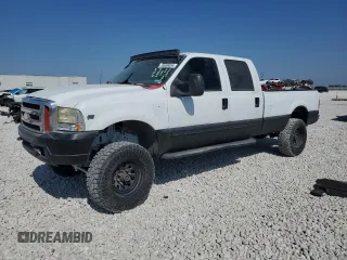 2000 Ford Super Duty F-250 XL with VIN 1FTNW21SXYEA52699, listed as a Copart auction lot 78659054 with 154,056 mi miles and Salvage Title. Bid and sale history available at carsss.com. Image 1.