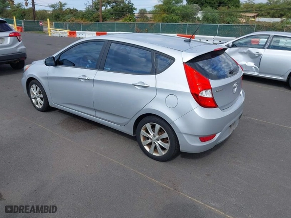 2012 Hyundai Accent SE with VIN KMHCU5AE7CU030632, listed as a IAAI auction lot 41290434 with 98,182 mi miles. Bid and sale history available at carsss.com. Image 3.