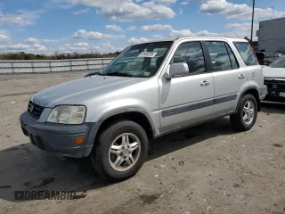 2000 Honda CR-V EX z VIN JHLRD1860YC060447, wystawiony jako Copart lot #50980295 z przebiegiem 129 417 mil mil oraz Szkoda całkowita • Salvage title. Historia ofert i sprzedaży dostępna na DreamBid. Obrazek 1.