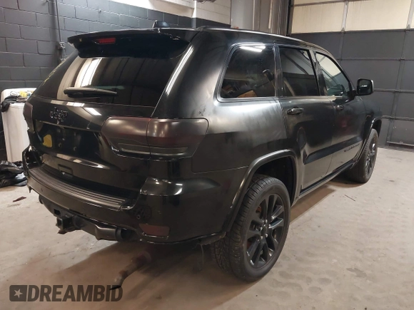 2021 Jeep Grand Cherokee Laredo X with VIN 1C4RJFAG3MC647726, listed as a IAAI auction lot 38421907 with 56,514 mi miles and . Bid and sale history available at DreamBid. Image 4.