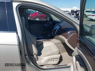 2015 Cadillac SRX Luxury Collection z VIN 3GYFNBE38FS641807, wystawiony jako IAAI lot #41669512 z przebiegiem 147 889 mil mil oraz . Historia ofert i sprzedaży dostępna na DreamBid. Obrazek 5.