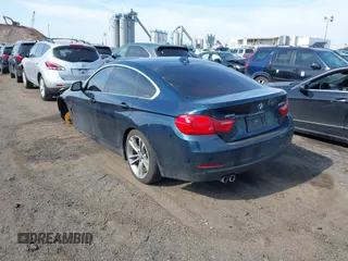 2016 BMW 4 Series 428i xDrive with VIN WBA4C9C56GG141089, listed as a IAAI auction lot 41587479 with 85,462 mi miles and . Bid and sale history available at DreamBid. Image 3.