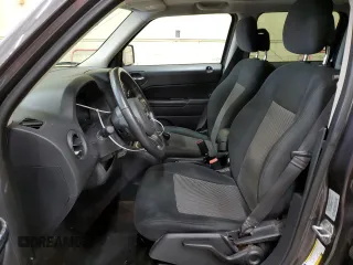 2015 Jeep Patriot Latitude with VIN 1C4NJPFB3FD353256, listed as a Copart auction lot 43928265 with 153,574 mi miles and Salvage Title. Bid and sale history available at DreamBid. Image 7.