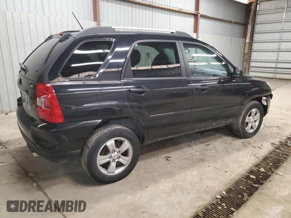 2009 Kia Sportage LX with VIN KNDJF724597564338, listed as a Copart auction lot 44123195 with 113,132 mi miles and Salvage Title. Bid and sale history available at carsss.com. Image 3.