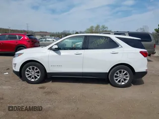 2018 Chevrolet Equinox LT z VIN 3GNAXJEV0JS648014, wystawiony jako IAAI lot #42193818 z przebiegiem 96 146 mil mil oraz . Historia ofert i sprzedaży dostępna na DreamBid. Obrazek 14.