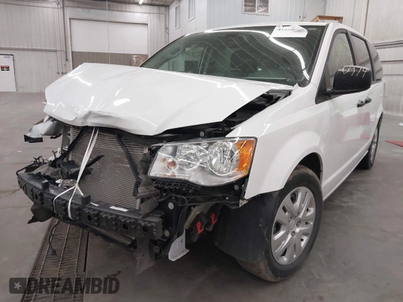 2020 Dodge Grand Caravan SE with VIN 2C4RDGBG4LR168233, listed as a IAAI auction lot 41680974 with 62,765 mi miles and . Bid and sale history available at DreamBid. Image 2.
