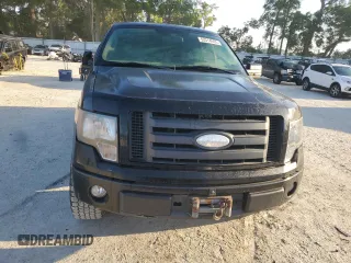 2009 Ford F-150 STX with VIN 1FTRX14W69FA23543, listed as a Copart auction lot 52314695 with 149,268 mi miles and Salvage Title. Bid and sale history available at DreamBid. Image 5.