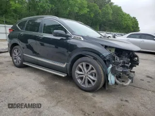 2020 Honda CR-V Touring with VIN 5J6RW2H93LL014590, listed as a Copart auction lot 53720635 with 63,951 mi miles and Salvage title. Bid and sale history available at DreamBid. Image 4.