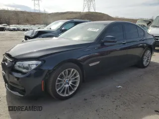 2015 BMW 7 Series 750i xDrive с VIN WBAYB6C55FD225259, выставлен на аукционе Copart как лот 51104975 с пробегом 93 307 миль миль и Списание • Salvage title. История ставок и продаж доступна на DreamBid. Изображение 1.