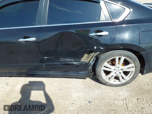 2014 Nissan Altima SL with VIN 1N4BL3AP7EC109242, listed as a IAAI auction lot 42026172 with 112,588 mi miles and . Bid and sale history available at DreamBid. Image 6.