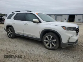 2024 Honda Pilot Touring z VIN 5FNYG2H74RB011187, wystawiony jako Copart lot #79999324 z przebiegiem 16 123 mil mil oraz Szkoda całkowita • Salvage title. Historia ofert i sprzedaży dostępna na DreamBid. Obrazek 4.