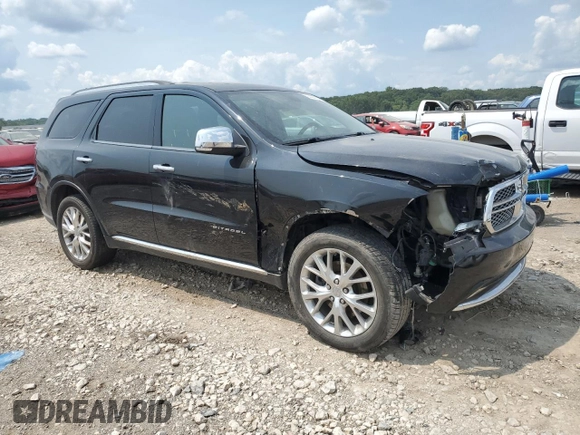 2014 Dodge Durango Citadel with VIN 1C4RDJEG5EC331766, listed as a Copart auction lot 64064154 with 92,018 mi miles and Salvage title. Bid and sale history available at DreamBid. Image 4.