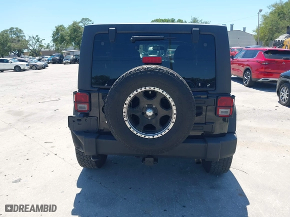 2013 Jeep Wrangler Unlimited Sport with VIN 1C4BJWDG7DL583686, listed as a IAAI auction lot 42037650 with 122,408 mi miles. Bid and sale history available at carsss.com. Image 17.