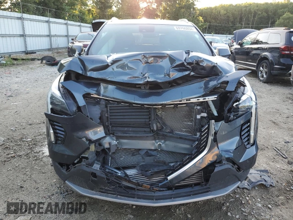 2019 Cadillac XT4 FWD Premium Luxury z VIN 1GYFZCR47KF123621, wystawiony jako Copart lot #69766894 z przebiegiem 68 191 mil mil oraz Szkody całkowita. Historia ofert i sprzedaży dostępna na DreamBid. Obrazek 5.