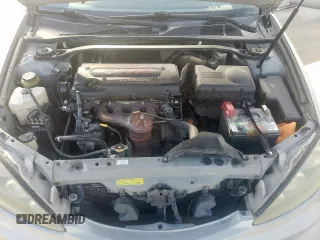 2006 Toyota Camry STD z VIN 4T1BE32K76U660821, wystawiony jako Copart lot #58806275 z przebiegiem 187 990 mil mil oraz Szkoda całkowita • Salvage title. Historia ofert i sprzedaży dostępna na DreamBid. Obrazek 11.