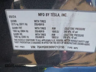 2024 Tesla Model Y with VIN 7SAYGDED8RF213796, listed as a IAAI auction lot 41634130 with 7,710 mi miles and . Bid and sale history available at DreamBid. Image 9.