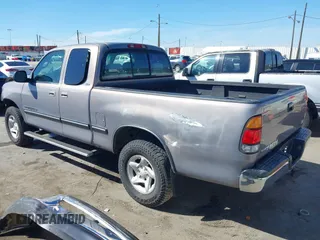 2001 Toyota Tundra SR5 with VIN 5TBRT34101S180512, listed as a IAAI auction lot 41802897 with 216,799 mi miles. Bid and sale history available at carsss.com. Image 3.