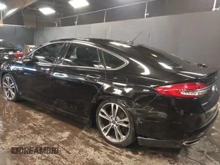 2017 Ford Fusion Titanium with VIN 3FA6P0D93HR197617, listed as a IAAI auction lot 41673022 with 65,041 mi miles and . Bid and sale history available at DreamBid. Image 6.