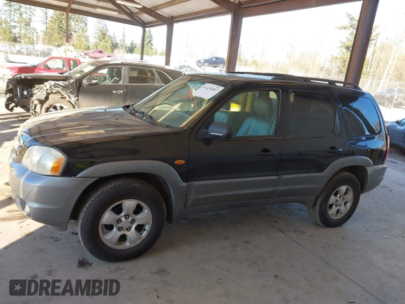 2002 Mazda Tribute LX with VIN 4F2CU08172KM58561, listed as a IAAI auction lot 41435407 with 141,908 mi miles and . Bid and sale history available at carsss.com. Image 14.