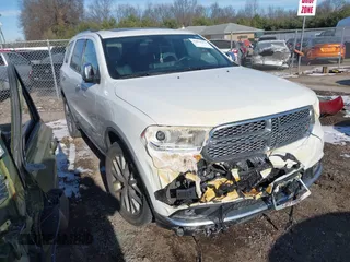 2014 Dodge Durango Citadel z VIN 1C4SDJET2EC330220, wystawiony jako IAAI lot #41073136 z przebiegiem 133 330 mil mil oraz . Historia ofert i sprzedaży dostępna na DreamBid. Obrazek 1.