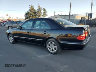 2002 Mercedes-Benz E-Class with VIN WDBJF65J42B471548, listed as a Copart auction lot 79754414 with 200,200 mi miles and Salvage Title. Bid and sale history available at carsss.com. Image 2.
