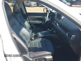 2021 Mazda CX-5 Grand Touring with VIN JM3KFBDM3M0493752, listed as a IAAI auction lot 42456854 with 35,122 mi miles and . Bid and sale history available at DreamBid. Image 5.