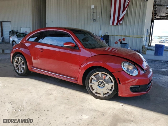 2012 Volkswagen Beetle 2.5L with VIN 3VWJX7AT7CM662822, listed as a Copart auction lot 74215804 with 115,890 mi miles and Salvage Title. Bid and sale history available at carsss.com. Image 4.