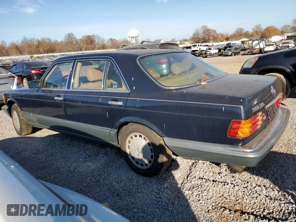 1986 Mercedes-Benz 560 with VIN WDBCA39DXGA233159, listed as a Copart auction lot 78498894 with 96,308 mi miles and Salvage Title. Bid and sale history available at DreamBid. Image 2.