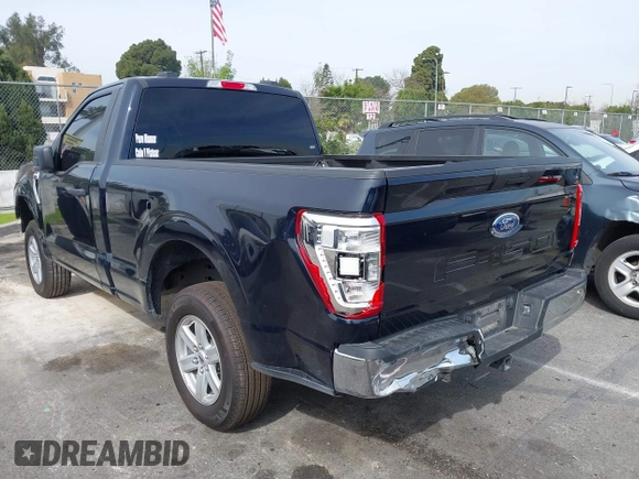 2023 Ford F-150 XL with VIN 1FTMF1C52PKG05729, listed as a IAAI auction lot 41685994 with 12,805 mi miles and . Bid and sale history available at carsss.com. Image 3.