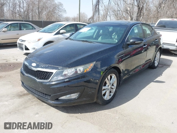 2013 Kia Optima EX z VIN 5XXGN4A7XDG198853, wystawiony jako IAAI lot #41807485 z przebiegiem 87 466 mil mil oraz . Historia ofert i sprzedaży dostępna na DreamBid. Obrazek 2.