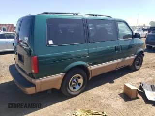 2001 GMC Safari with VIN 1GKDM19W71B511332, listed as a Copart auction lot 56097624 with 124,493 mi miles and Salvage Title. Bid and sale history available at carsss.com. Image 3.