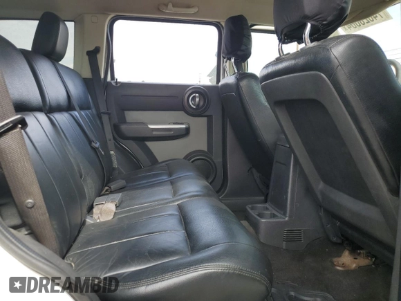 2010 Dodge Nitro SXT z VIN 1D4PT5GK8AW100343, wystawiony jako Copart lot #74628804 z przebiegiem 156 612 mil mil oraz Szkoda całkowita • Salvage title. Historia ofert i sprzedaży dostępna na DreamBid. Obrazek 11.