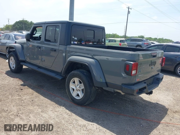 2021 Jeep Gladiator Sport S z VIN 1C6JJTAG9ML538769, wystawiony jako IAAI lot #42078142 z przebiegiem 49 924 mil mil oraz . Historia ofert i sprzedaży dostępna na DreamBid. Obrazek 3.