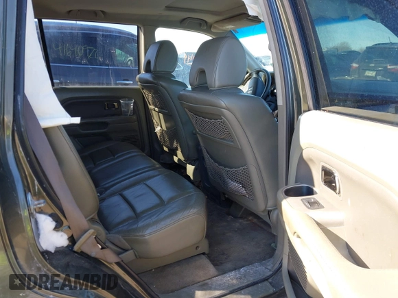 2006 Honda Pilot EX-L with VIN 5FNYF18596B016974, listed as a IAAI auction lot 41634049 with 161,687 mi miles and . Bid and sale history available at DreamBid. Image 8.
