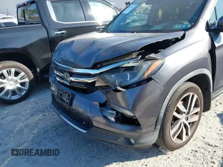 2016 Honda Pilot Elite with VIN 5FNYF6H01GB050555, listed as a IAAI auction lot 41670197 with 140,000 mi miles. Bid and sale history available at carsss.com. Image 6.