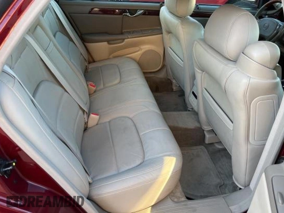 2002 Cadillac DeVille DTS with VIN 1G6KF57912U135771, listed as a Copart auction lot 82052554 with 56,268 mi miles and Clean Title. Bid and sale history available at carsss.com. Image 6.