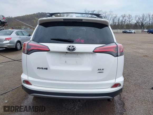 2018 Toyota RAV4 XLE with VIN JTMRFREV9JJ218173, listed as a IAAI auction lot 42037959 with 91,056 mi miles. Bid and sale history available at carsss.com. Image 17.