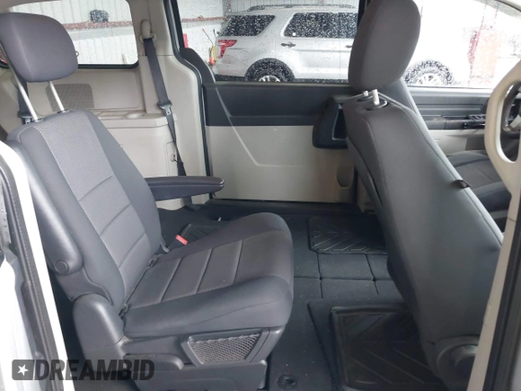 2008 Dodge Grand Caravan SE z VIN 2D8HN44H98R116389, wystawiony jako IAAI lot #42228749 z przebiegiem 187 378 mil mil oraz . Historia ofert i sprzedaży dostępna na DreamBid. Obrazek 8.