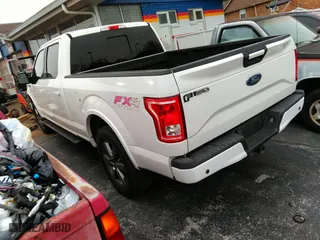 2015 Ford F-150 XLT w/HD Payload Pkg with VIN 1FTFW1EG8FFA12438, listed as a IAAI auction lot 41743982 with 174,799 mi miles. Bid and sale history available at carsss.com. Image 3.