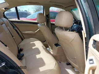 2004 BMW 3 Series 325i with VIN WBAET37424NJ96343, listed as a IAAI auction lot 41721056 with 186,848 mi miles. Bid and sale history available at carsss.com. Image 8.