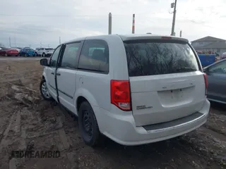 2014 Dodge Grand Caravan SE with VIN 2C4RDGBG9ER283848, listed as a IAAI auction lot 41666021 with 120,351 mi miles and . Bid and sale history available at DreamBid. Image 3.