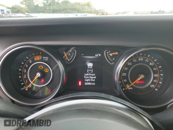 2022 Jeep Wrangler Unlimited Willys with VIN 1C4HJXDN2NW253579, listed as a Copart auction lot 73274214 with 22,583 mi miles and Salvage Title. Bid and sale history available at DreamBid. Image 9.