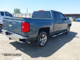 2014 Chevrolet Silverado 1500 LT with VIN 3GCPCREC7EG149859, listed as a IAAI auction lot 41974521 with 113,757 mi miles. Bid and sale history available at carsss.com. Image 4.