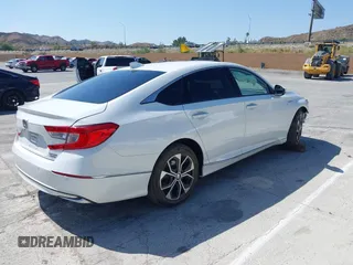 2021 Honda Accord Touring with VIN 1HGCV3F95MA000714, listed as a IAAI auction lot 42350127 with 69,731 mi miles and . Bid and sale history available at DreamBid. Image 4.