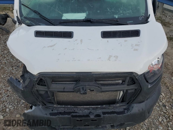 2022 Ford Transit Cargo z VIN 1FTBR1X8XNKA23913, wystawiony jako Copart lot #82981284 z przebiegiem Nie podano mil oraz Szkoda całkowita • Salvage title. Historia ofert i sprzedaży dostępna na DreamBid. Obrazek 7.