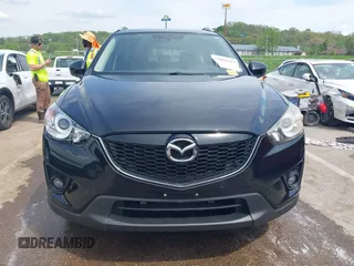 2013 Mazda CX-5 Grand Touring with VIN JM3KE4DE6D0148030, listed as a IAAI auction lot 42082947 with 119,432 mi miles and . Bid and sale history available at DreamBid. Image 12.