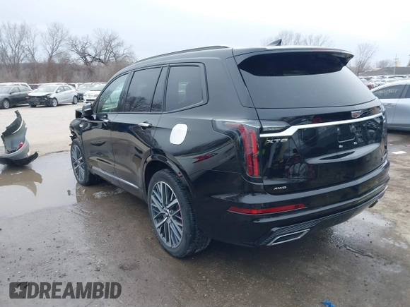 2022 Cadillac XT6 Sport with VIN 1GYKPHRS3NZ138698, listed as a IAAI auction lot 41547570 with 15,919 mi miles. Bid and sale history available at carsss.com. Image 3.