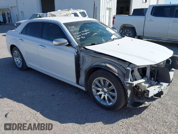 2014 Chrysler 300 with VIN 2C3CCAEG4EH312930, listed as a IAAI auction lot 41907509 with 128,940 mi miles. Bid and sale history available at carsss.com. Image 1.