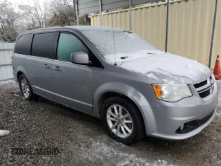 2019 Dodge Grand Caravan SXT with VIN 2C4RDGCG1KR595981, listed as a Copart auction lot 88133645 with 104,852 mi miles and Salvage Title. Bid and sale history available at DreamBid. Image 4.