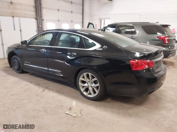 2015 Chevrolet Impala LTZ with VIN 2G1165S38F9145916, listed as a IAAI auction lot 41982242 with 303,316 mi miles. Bid and sale history available at carsss.com. Image 3.